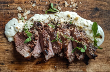 Roasted Beef with Fresh Horseradish Cream on a chopping board