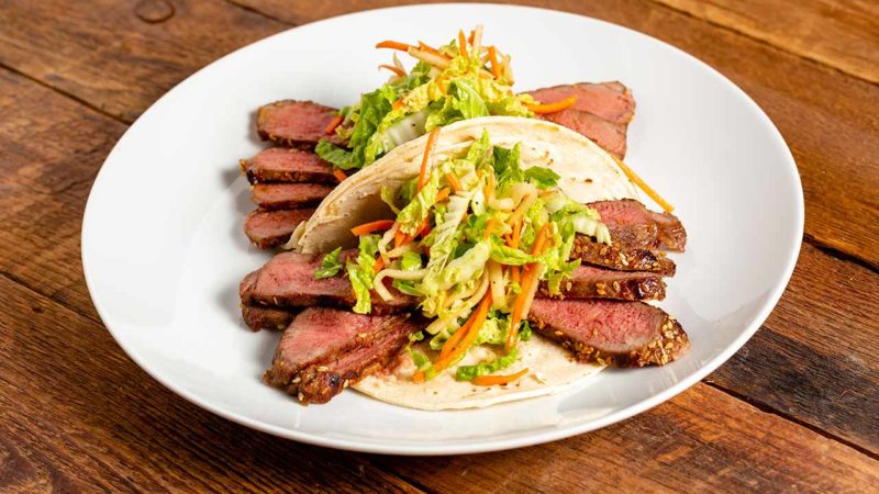 NY strip and cabbage slaw wrapped in a tortilla