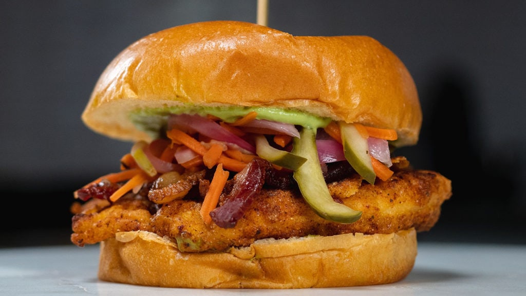 fried chicken sandwich with pickled slaw and avocado mayonnaise