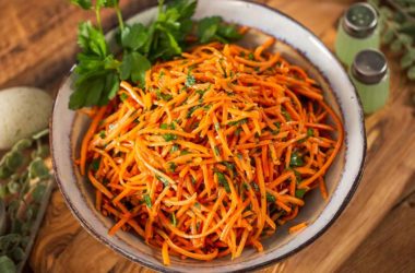 shredded carrot and parsley salad in a bowl