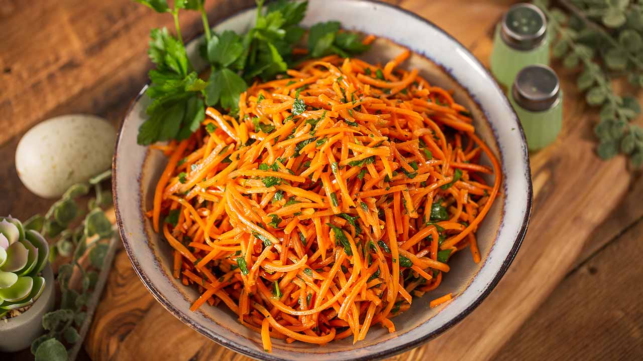 shredded carrot and parsley salad in a bowl