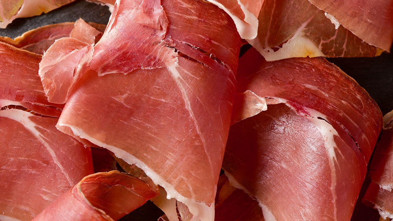 closeup of some delicious slices of spanish serrano ham
