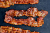 oven cooked bacon on a slate counter