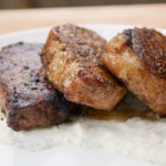 three grilled pork chops