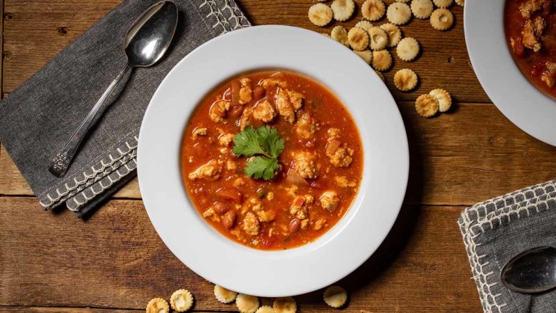turkey chili in bowl with oyster crackers