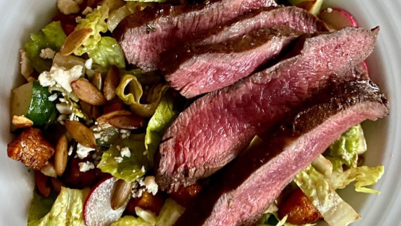 steak salad with chilis and squash