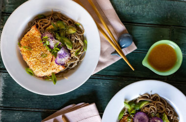 veggie filled noodles and salmon