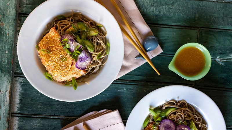 veggie filled noodles and salmon