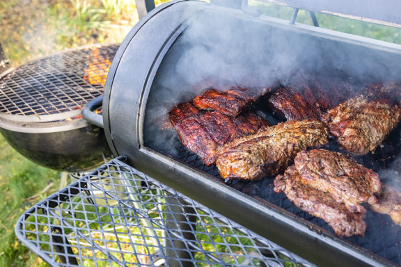 ribs and steaks in smoker