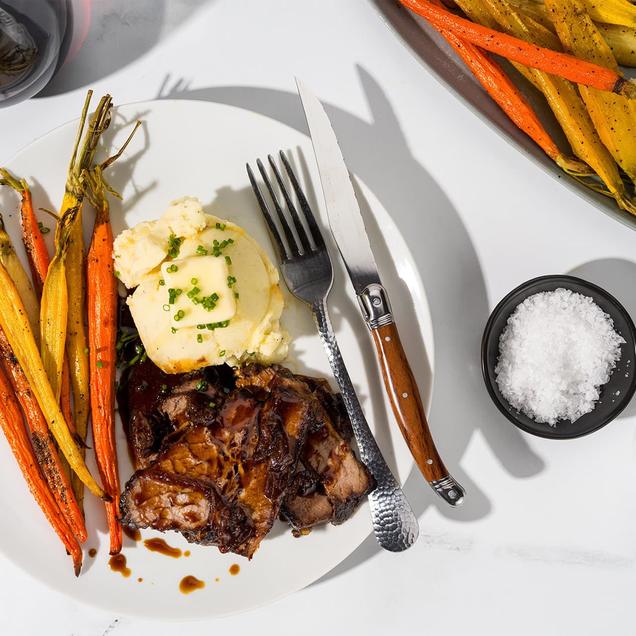 https://justcook.butcherbox.com/wp-content/uploads/2023/08/Braised_brisket_plated_1280x1280.jpg