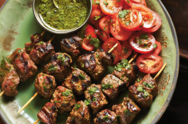 Hariyali Lamb Tikka with Tomato Salad on a plate
