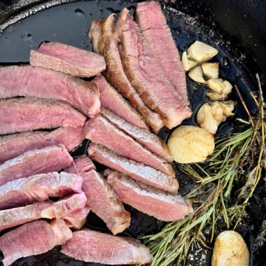 Strip loin in a cast iron skillet
