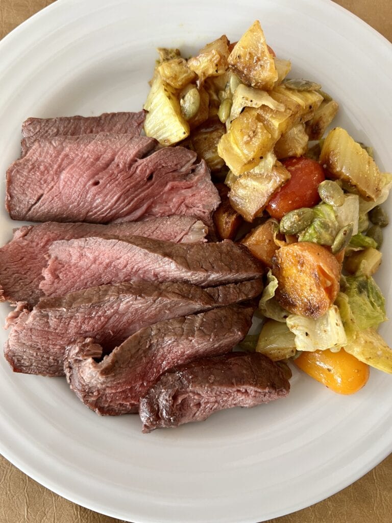 Filet mignon with roasted vegetable salad