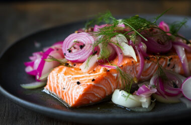 Slow-Roasted Salmon with Pickled Onions and Fennel on a plate