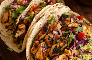 Grilled Jerk Chicken Tacos on a chopping board