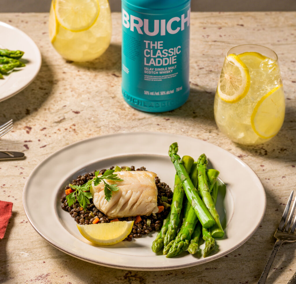 sablefish and asparagus with beverage