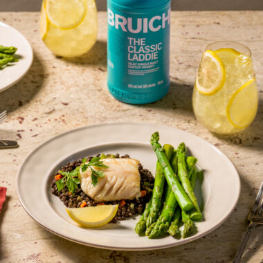 sablefish and asparagus with beverage