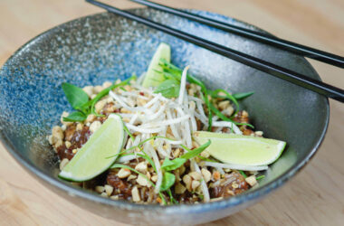 Chicken Pad Thai in a bowl with chopsticks